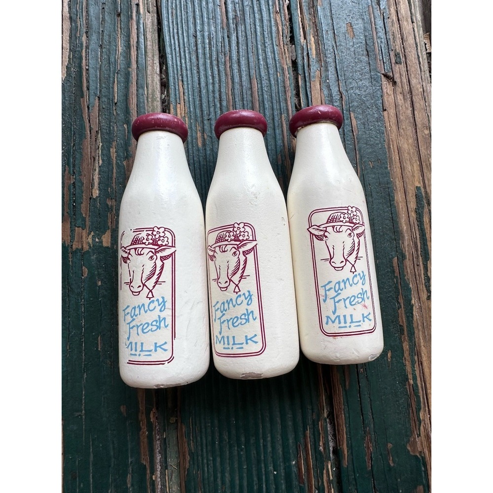 Pottery barn Kids 3 Piece Wooden Milk Bottle Set